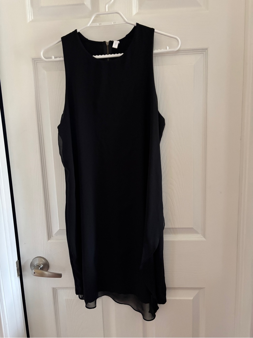 Gentle Fawn Black Sleeveless Mini Dress with sheer front fabric overlay